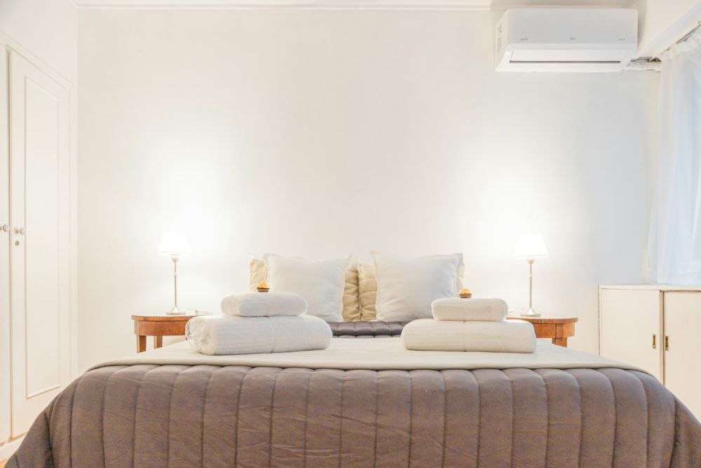 Clean bed with fresh white linen