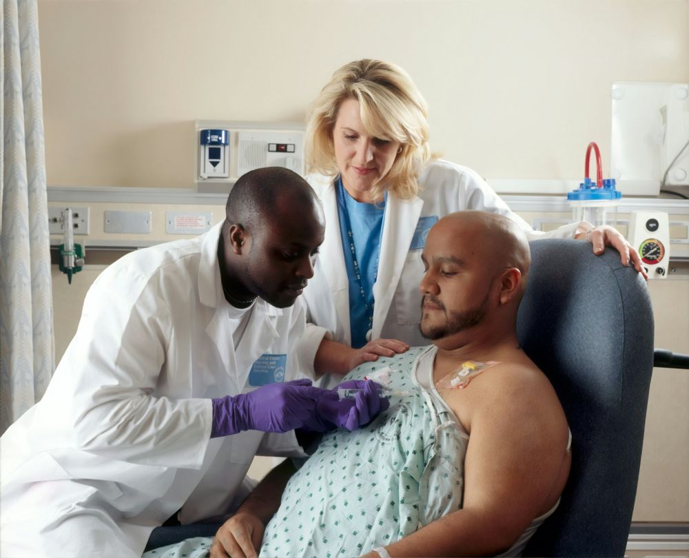 Nurse caring for an elderly patient